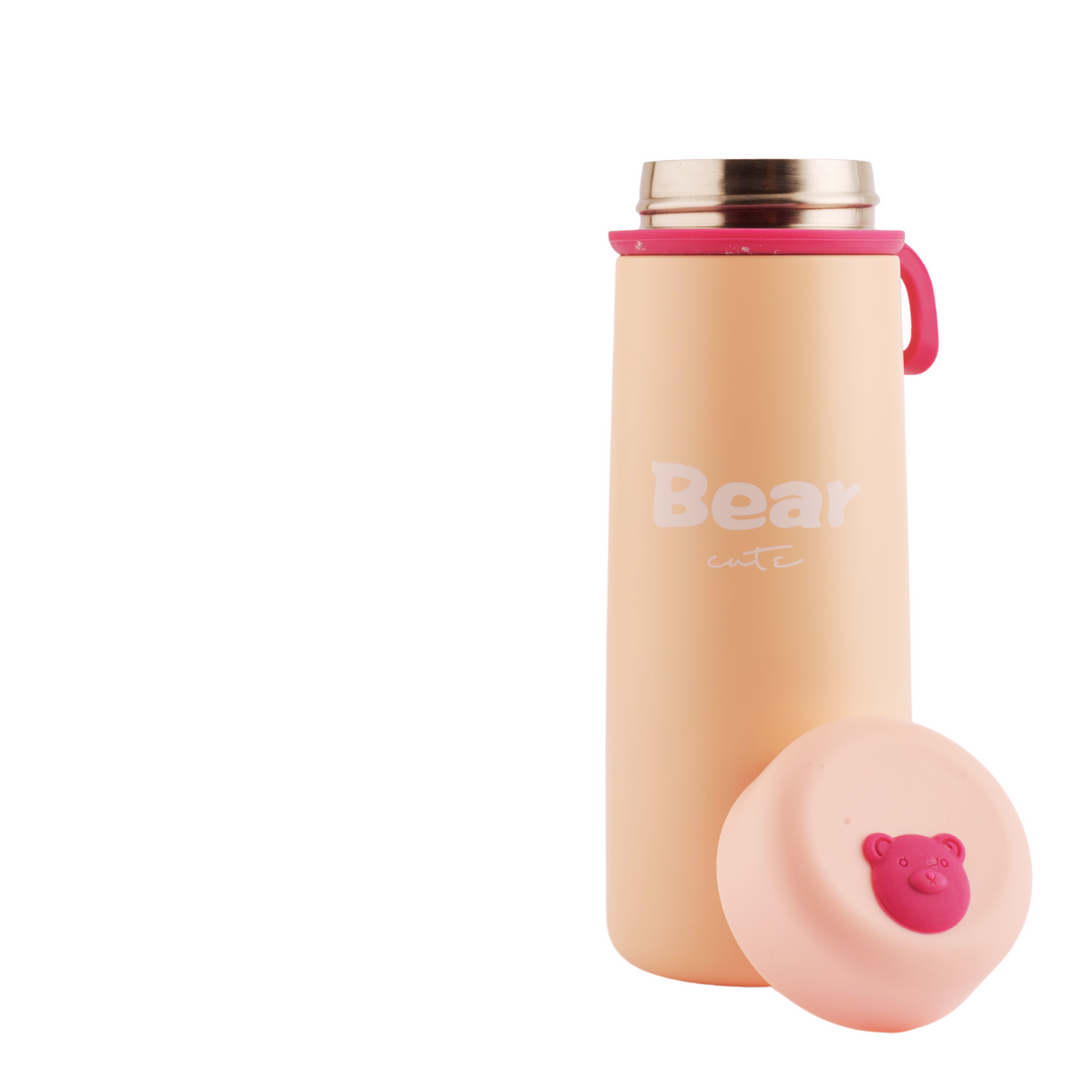 Refillable stainless steel insulated bottle with a leakproof lid in a matte pastel color. Perfect for travel. 440ml capacity. Peach 2