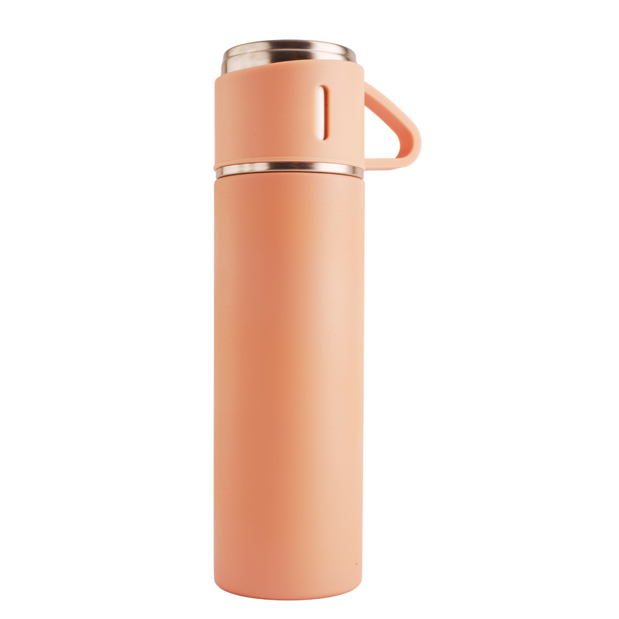  Refillable stainless steel insulated tea flask with a leakproof lid that doubles as a cup. Perfect for travel. 500ml capacity. Peach colour.