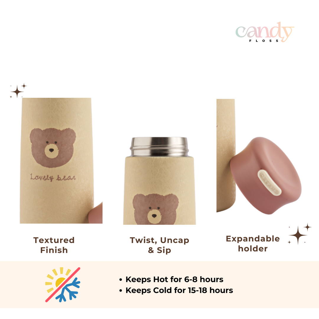 Stainless steel vacuum insulated flask with a cute bear illustration on the side.