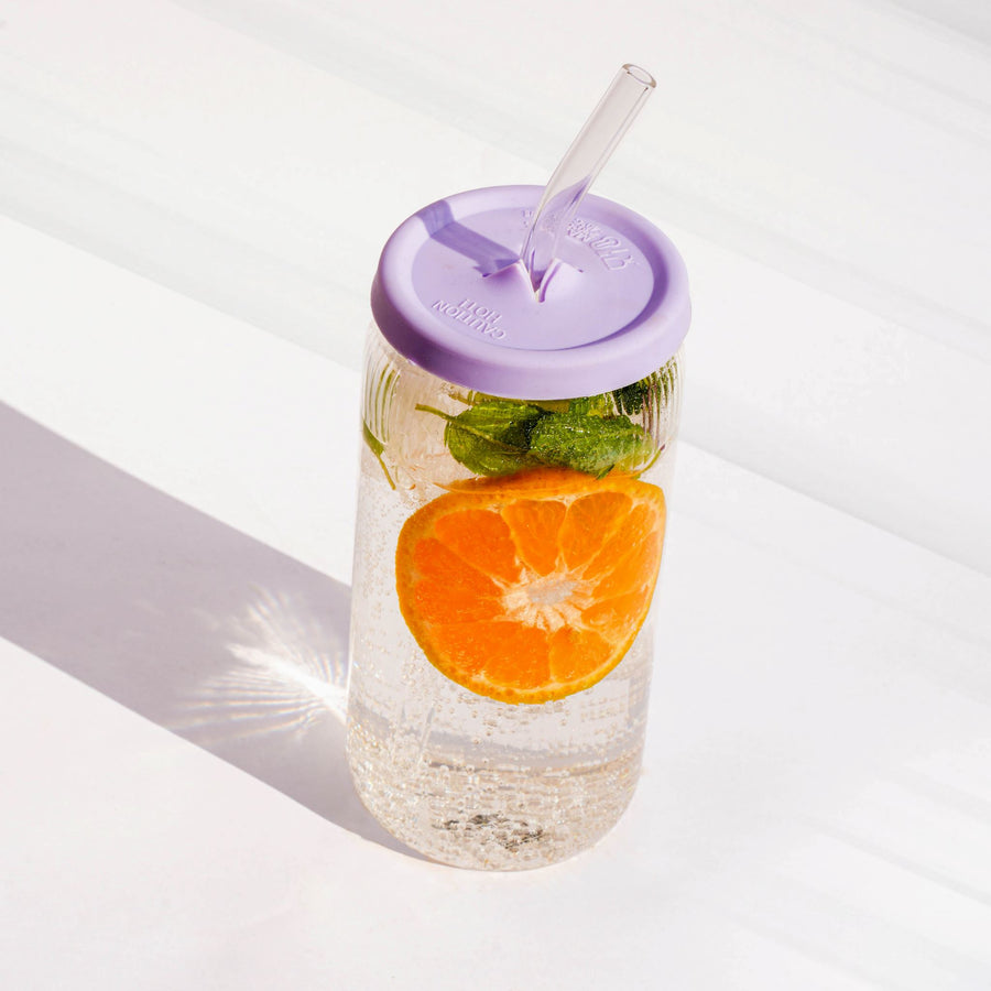 Glass jar with silicone lid and glass straw. Perfect for smoothies, juice, iced tea, or any beverage.