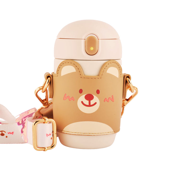 Refillable stainless steel insulated flask with a cute bear design, leakproof lid, and brown premium leather carrying loop strap.