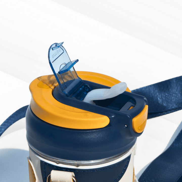 Travel Sipper with Leatherette Sleeve And a Strap Sipper
