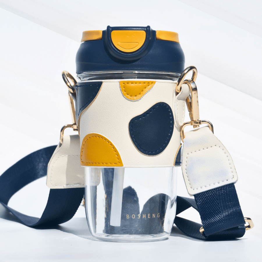 Travel Sipper with Leatherette Sleeve And a Strap Sipper