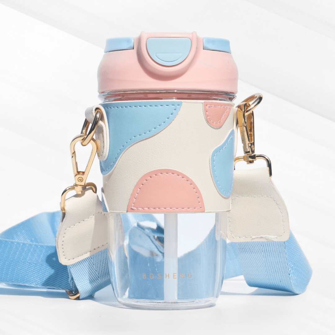 Travel Sipper with Leatherette Sleeve And a Strap Sipper