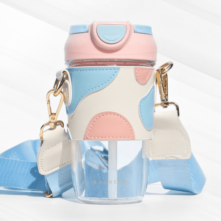 Travel Sipper with Leatherette Sleeve And a Strap Sipper