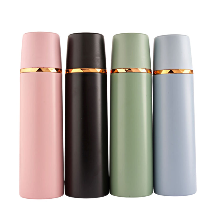 Refillable stainless steel insulated bottle with a leakproof lid and a leather strap for easy carrying. Perfect for travel. 500ml capacity. Available in pastel colors.