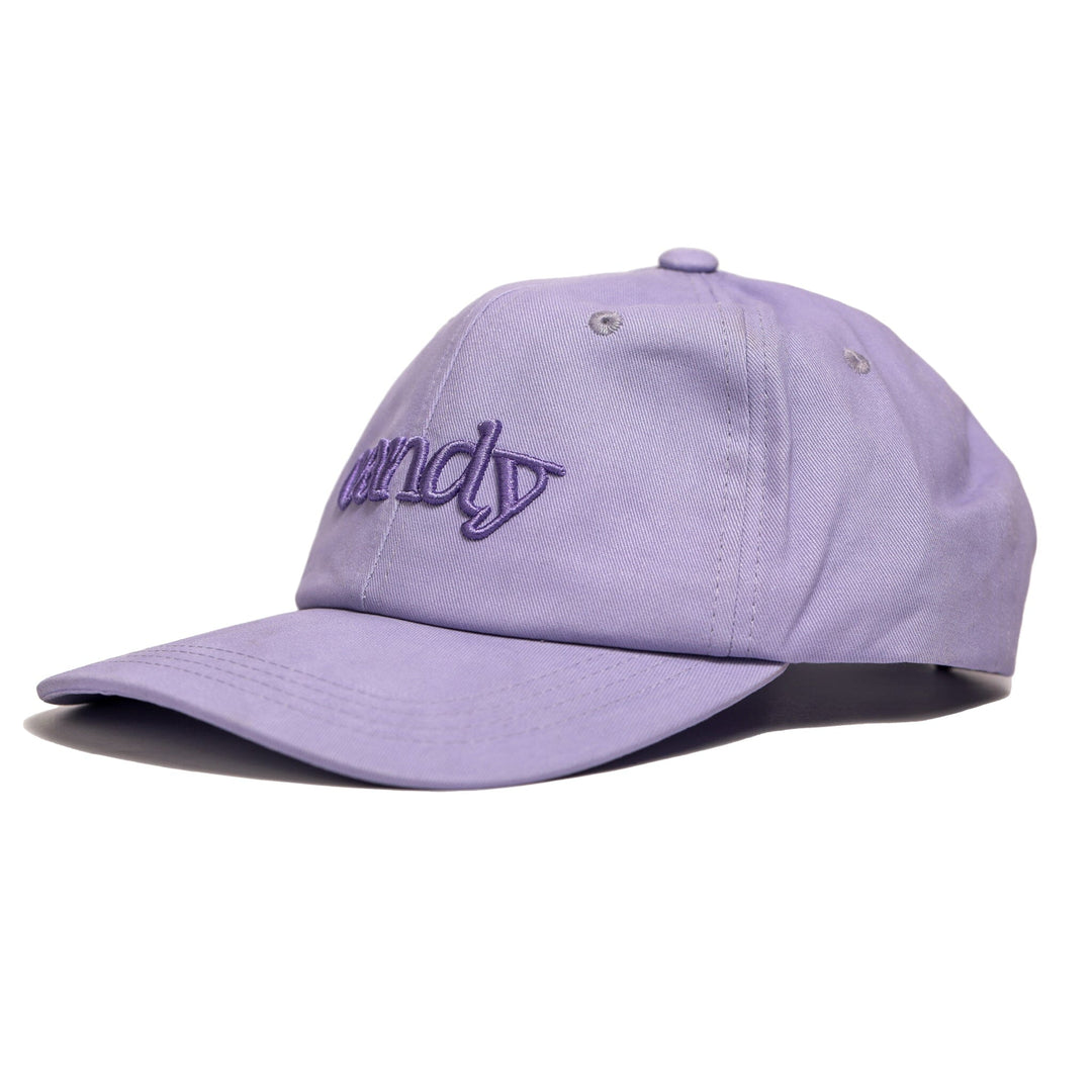 A purple cotton baseball cap with a curved brim and an adjustable strap in the back. The cap is plain with no embroidery or other designs.